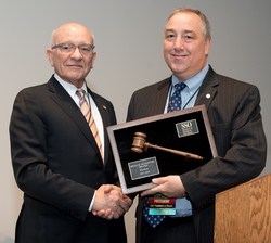 Dr. McMasters and Dr. Giuliano with gavel